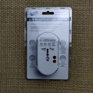 American tourister all in 1 plug with surge